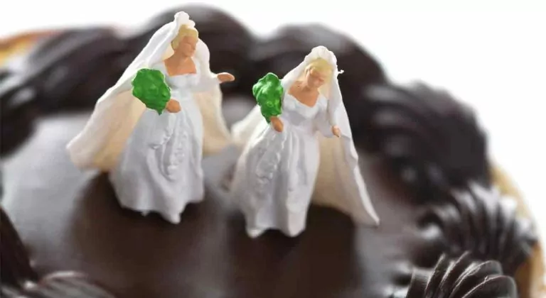 A set of lesbian wedding cake toppers