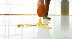 Man about to step on banana peel